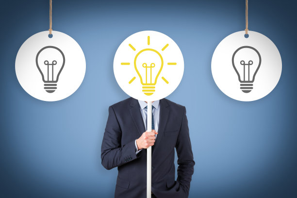 创意概念与灯泡在一个蓝色的背景图片下载
