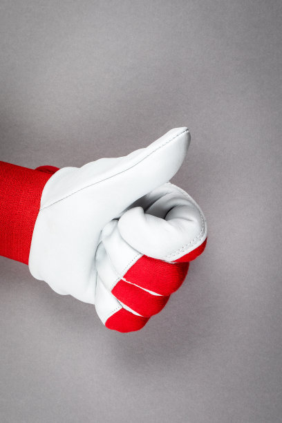 拇指。戴着皮工作手套的男人的手图片下载