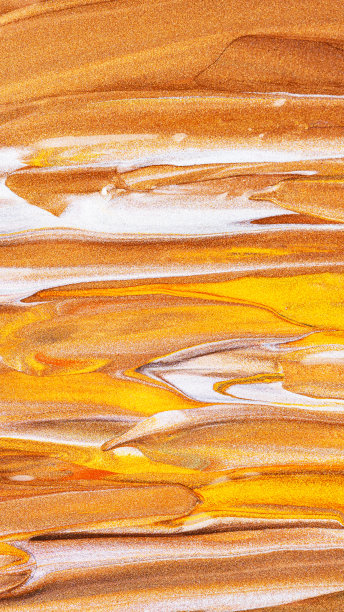 橙色的棕色背景与闪闪发光的污点。抽象的油漆纹理。节日的背景图片下载