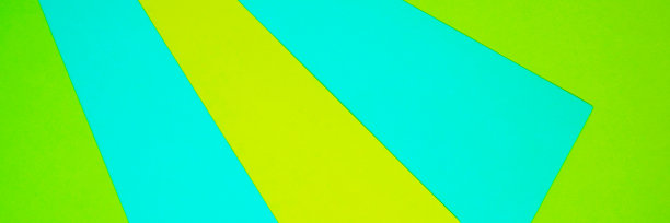 抽象的几何组成。黄色、淡蓝色、绿色的条纹纸。图片下载