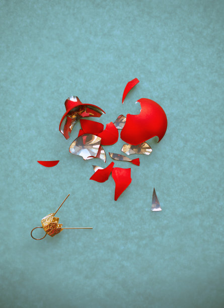 蓝色背景上破碎的红心图片下载