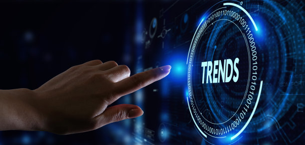 商业，技术，互联网和网络概念。一个年轻的商人正在一个未来的虚拟屏幕上工作，看到上面写着:趋势图片下载