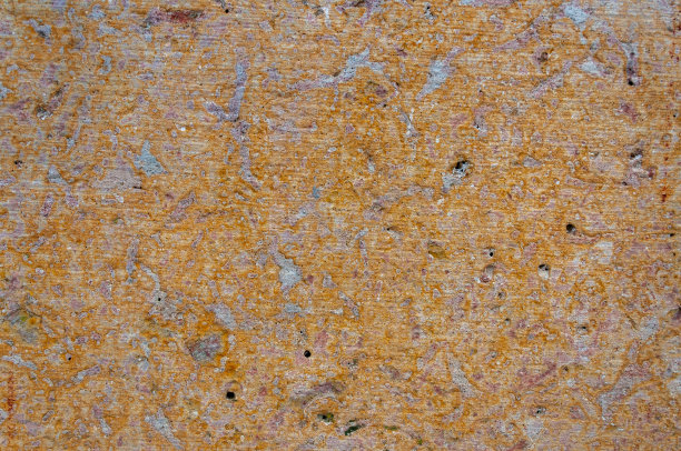 砂岩表面黄褐色图案纹理背景图片下载