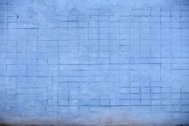 老房子的垃圾墙。纹理背景图片下载