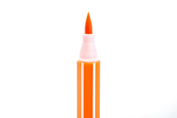 白色背景上的橙色魔术笔图片下载