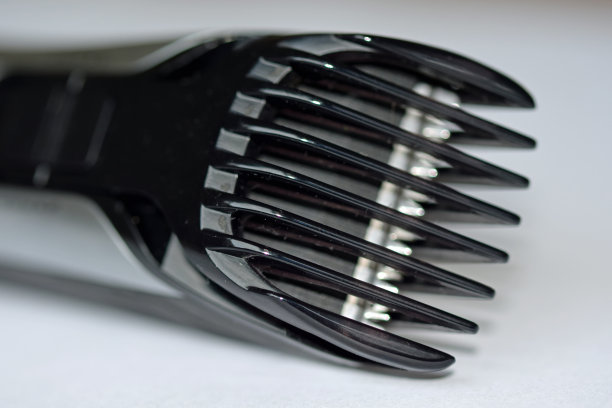 剪子的微距照片修剪和剃发由理发师图片下载