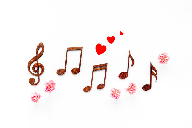 情人节的音乐伴随着音符和鲜花。爱的歌曲图片下载