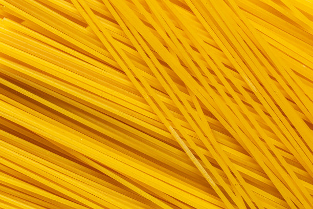 黄色长面条背景特写。微距摄影。图片下载