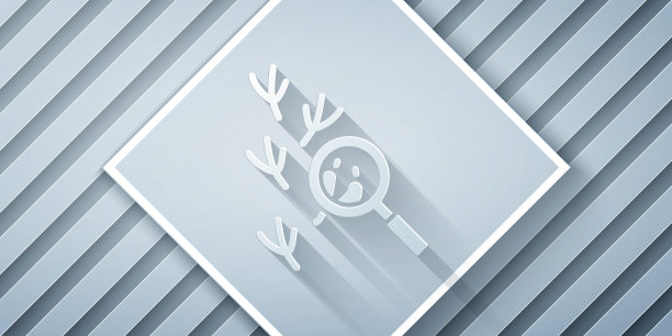 剪纸鸟脚印在放大镜下图标孤立在灰色背景。动物的脚。纸艺术风格。向量图片下载