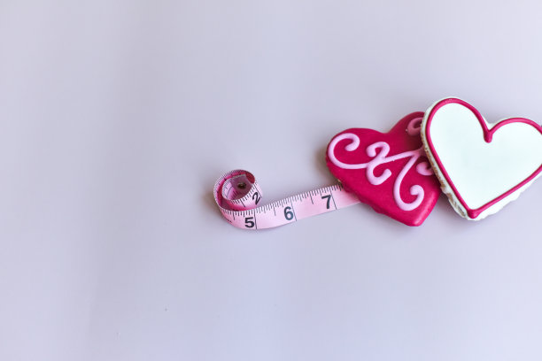 糖饼干/测量磁带-重量控制概念图片下载