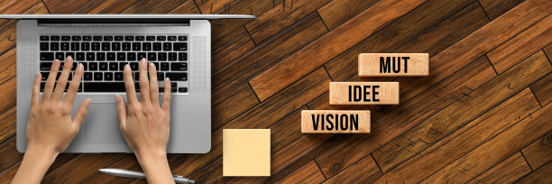 立方体与德国信息的视觉，想法，勇气和手的笔记本电脑图片下载