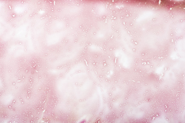 抽象的粉色油漆背景。油漆污渍和飞溅。流体艺术。图片下载