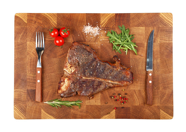 近距离观察木板上的上等牛排图片下载