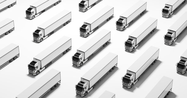 一队崭新的白色重型卡车。交通、运输行业图片下载