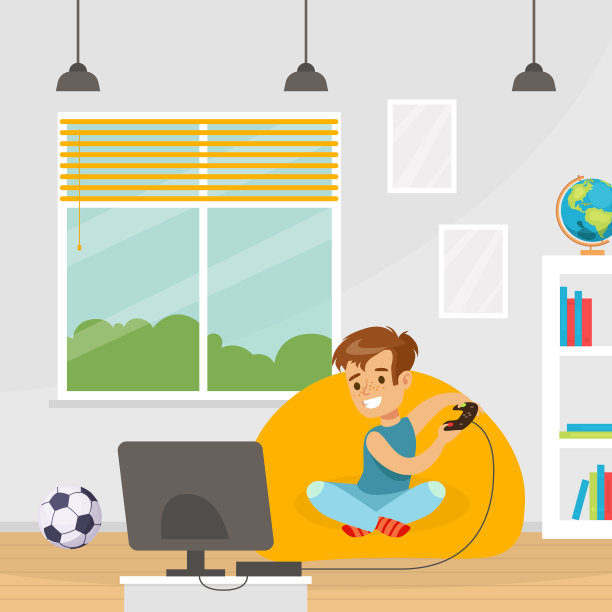 可爱的男孩坐在扶手椅上玩视频图片下载