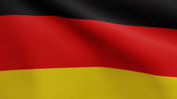 迎风飘扬的德国国旗。近处的德国旗帜吹拂，丝质柔软。图片下载
