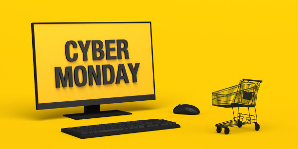 网络星期一横幅。后台有电脑和网上购物车。图片下载