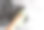 穿着t恤的妇女在洗衣房的熨衣板上烫衣服。图片下载