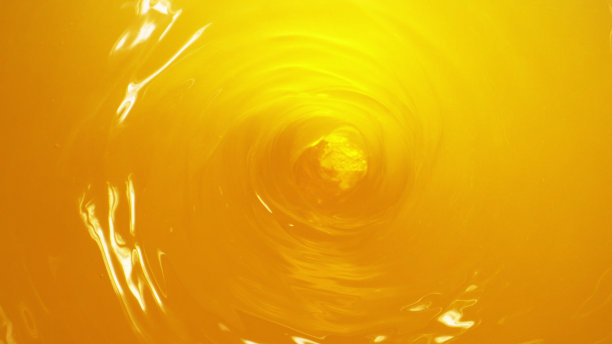 橘子汁在扭汁机的细节，冷冻运动图片下载