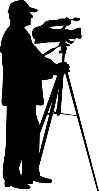 带着摄像机的剪影男人图片下载