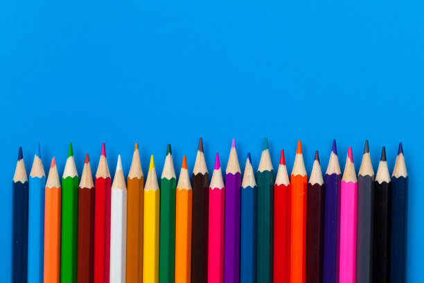 背景从彩色铅笔在蓝色的纸图片下载