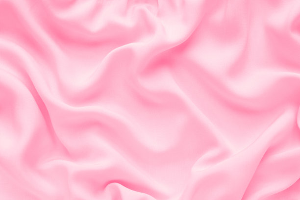 抽象的背景，奢华的粉红色面料，波浪褶皱，丝绸质地，图片下载