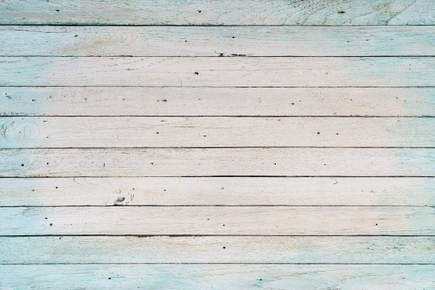 老裂纹风化抽象的白色和蓝色镶板的木材背景与大量的木纹和纹理。图片下载
