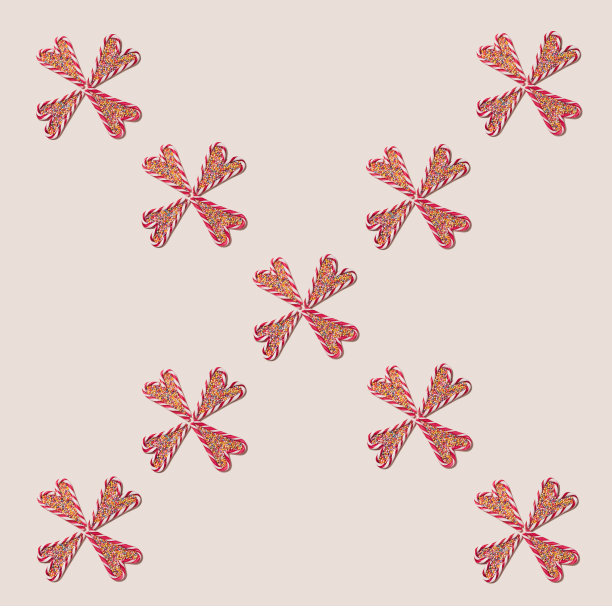 最小的八个糖果拐杖形成三叶草图案。平铺安排在乐观的米色背景。超现实主义的十字交叉。图片下载