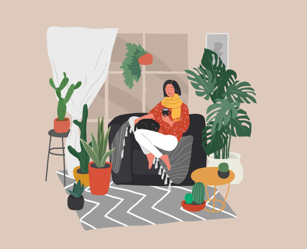 女孩和一只猫坐在沙发上休息图片下载