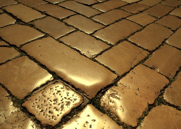 金色的古色古香的人行石被阳光照亮图片下载
