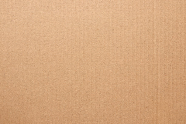 棕色硬纸板抽象背景，纹理回收纸盒在旧的复古模式设计艺术作品。图片下载