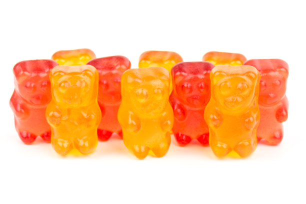 儿童维生素以熊的形式排列。很多五颜六色的儿童果冻糖果。图片下载