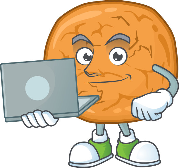 聪明的学生用笔记本电脑制作饼干图片下载