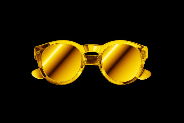 金色太阳眼镜黑色背景孤立近距离，金色金属太阳眼镜，闪亮的黄色金属太阳眼镜，豪华魅力时尚配饰设计，夏日海滩度假，夜店派对风格图片下载