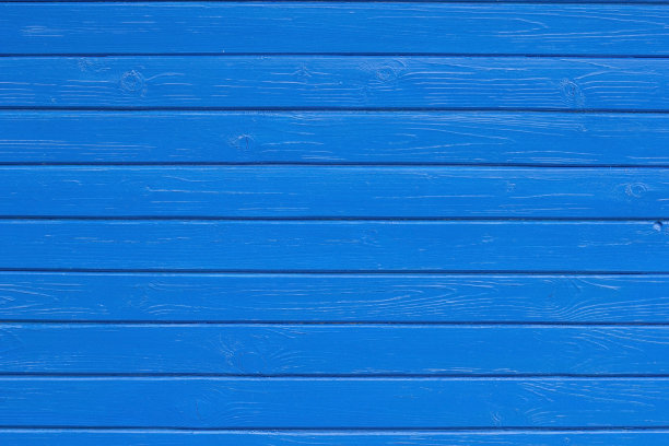 蓝色木板背景。木头上的蓝色油漆。背景。图片下载