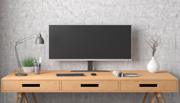 空白宽屏显示模拟。工作场所与木桌和混凝土墙。图片下载