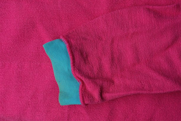 红色羊毛织物质地单袖毛衣图片下载