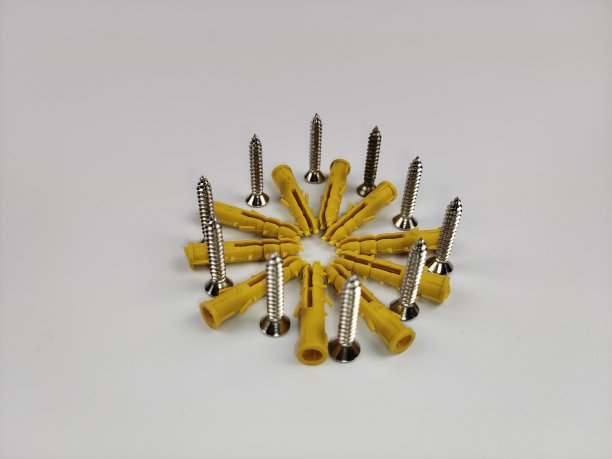 黄色墙塞和不锈钢螺丝图片下载