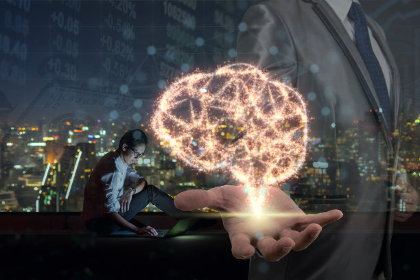 商人手握大脑的双重曝光基于亚洲商人使用智能手机显示股票市场图表，人工智能或人工智能概念图片下载