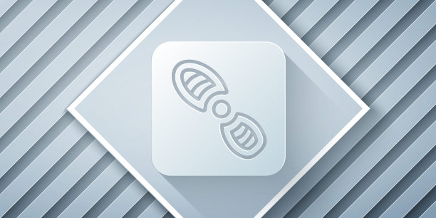 剪纸人类脚印鞋图标孤立在灰色背景。鞋鞋底。纸艺术风格。向量图片下载