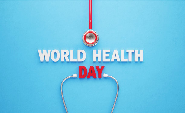 世界卫生日概念——世界卫生日致辞和蓝色背景下的红色听诊器图片下载