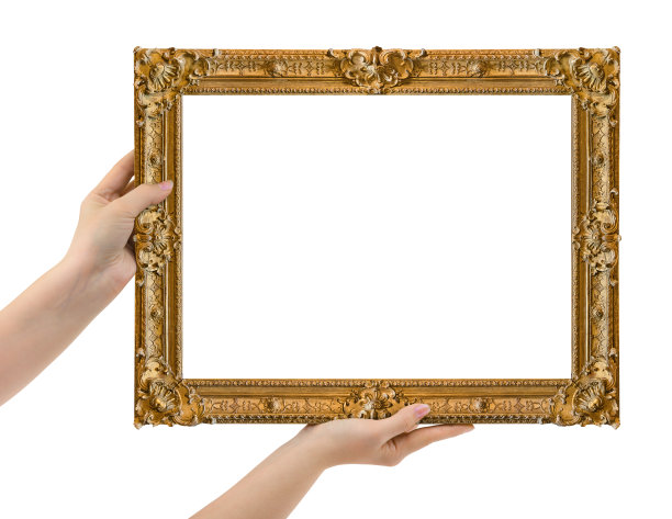 手里拿着木制的画框图片下载