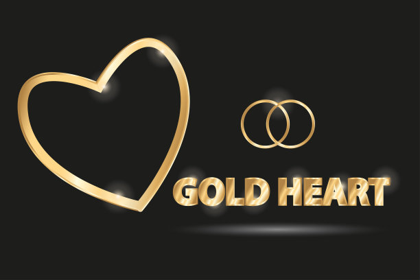 黑色背景上的金心和两枚婚戒图片下载