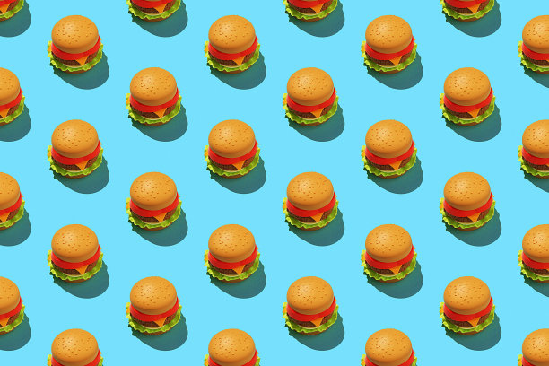 极简汉堡图案的蓝色背景。图片下载