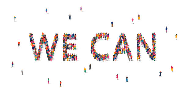 一大群人站在“我们能”这个词。人会改变世界。观念变革、新思维、自觉选择、思考人口、未来、创新。素材图片