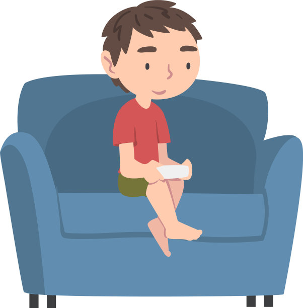 男孩坐在扶手椅上玩着操纵杆图片下载