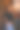 一个年轻漂亮的黑发拉丁裔，长直发，黑色短t恤和粉色裤子。一个女人靠在一个有痂的雕塑上的肖像图片下载