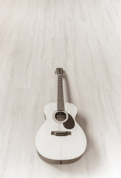 木地板上的木吉他图片下载