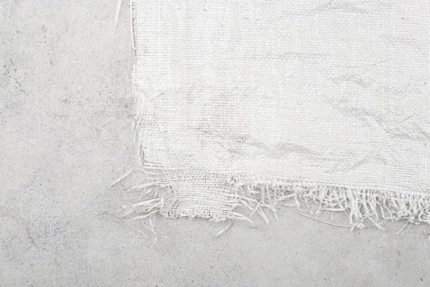 白色编织袋纹理上的石材背景。图片下载