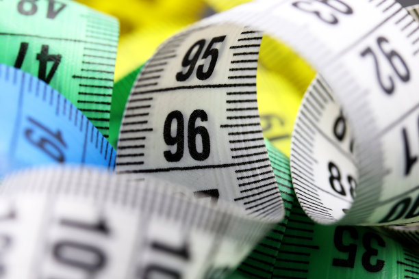 特写彩色卷尺的背景图片下载